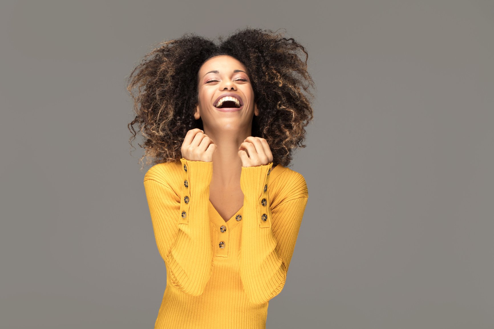 Happy african american woman smiling.