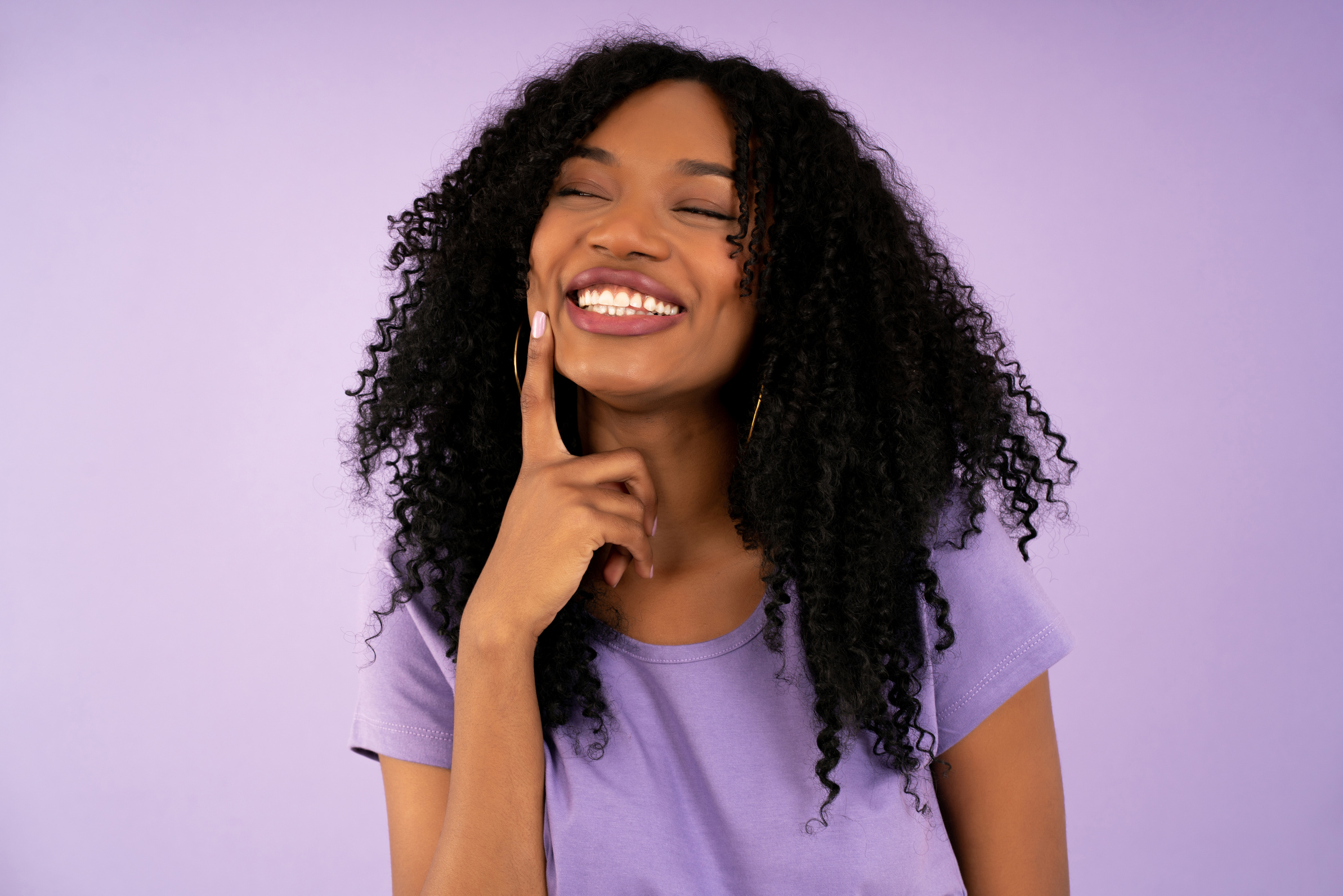 Portrait of a Young Afro Woman Smiling.